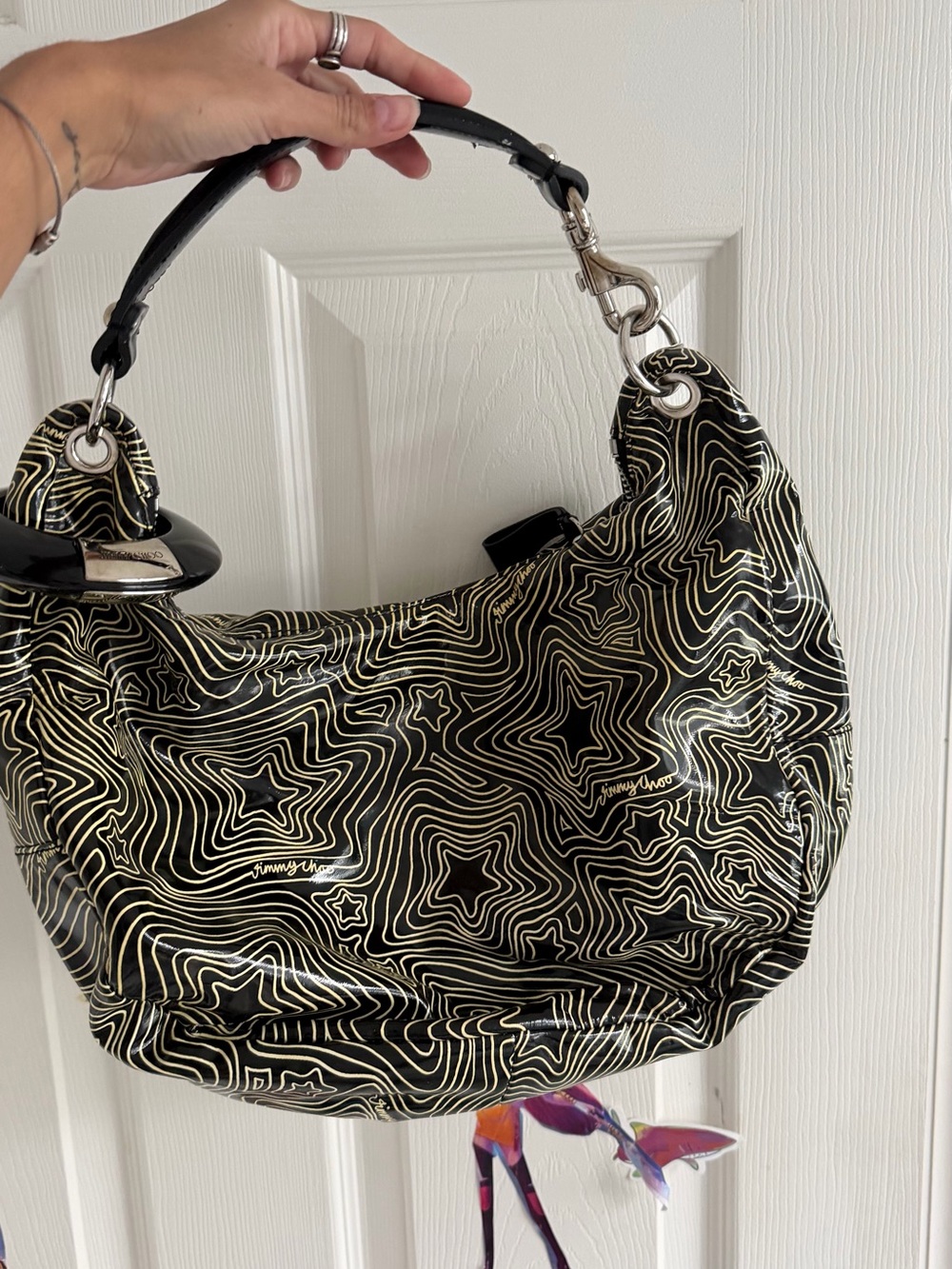 Jimmy Choo Black Hobo Bag with Cream Topographic Star Pattern